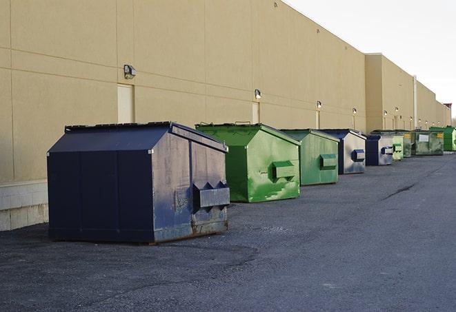 brightly colored dumpsters filled with construction waste in Culver City